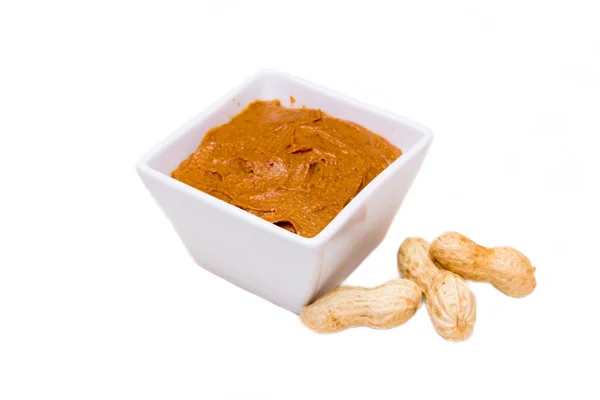 Bowl with peanut butter — Stock Photo, Image