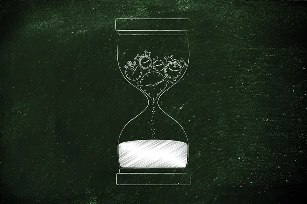 Песочные часы с часами и секундомерами — стоковое фото