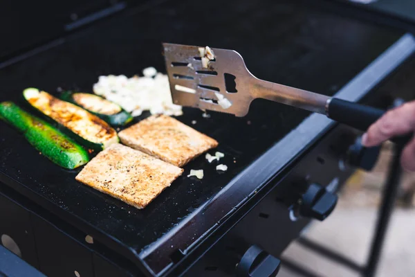 healthy plant-based food recipes concept, vegan tempeh zucchini and onion barbecue