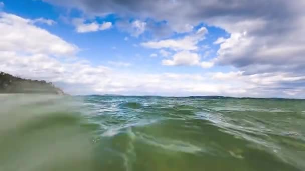 View Ocean Surrounding Coastline While Swimming Crystal Clear Blue Water — Stock Video