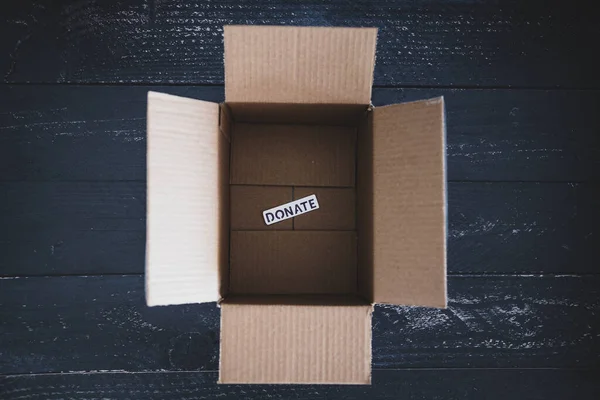 Charity Donation Decluttering Items Thrifted Concept Empty Box Donate Label — Stock Photo, Image