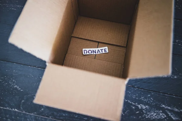 Charity Donation Decluttering Items Thrifted Concept Empty Box Donate Label — Stock Photo, Image