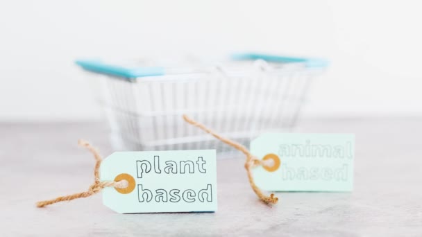 Plant Based Animal Based Product Tags Grocery Shopping Basket Hand — Stock Video