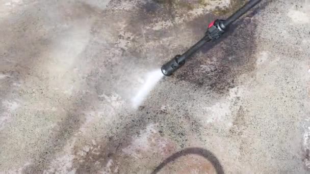 High Pressure Washer Cleaning Backyard Driveway Concrete Paving Removing Dirt — Stock Video