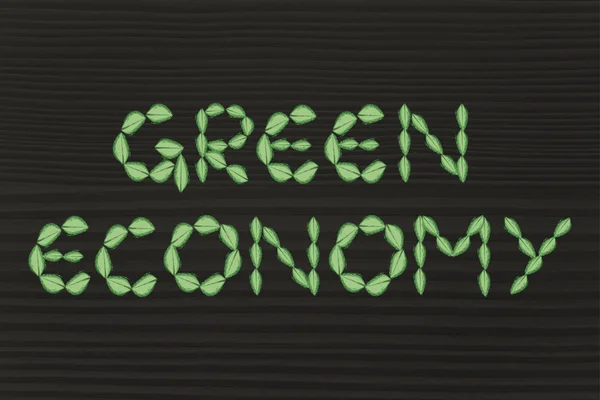 Зеленая экономика письма из листьев — стоковое фото