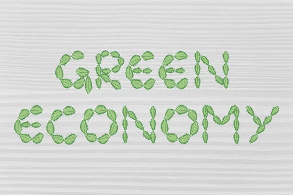 Green economy writing made of leaves — Stock Photo, Image