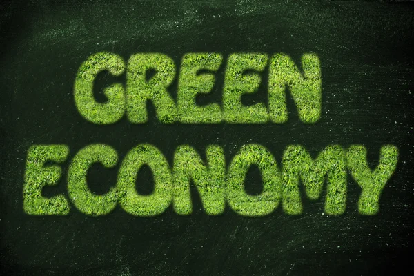 Groene economie schrijven gemaakt van gras textuur — Stockfoto