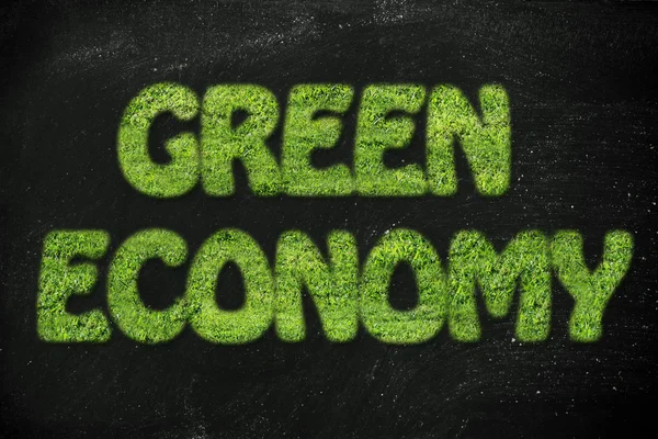 Написання зеленої економіки з текстури трави — стокове фото