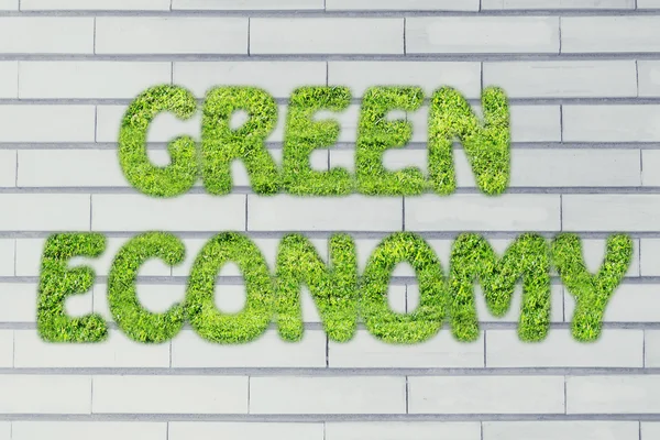 Zielonej gospodarki pismo z tekstura trawa — Zdjęcie stockowe
