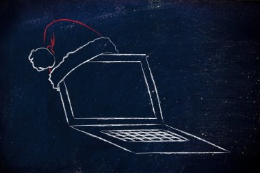 Santa claus şapka, Noel alışveriş online kavramı ile bilgisayar