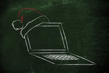 Santa claus şapka, Noel alışveriş online kavramı ile bilgisayar