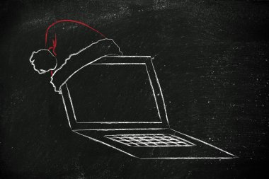 Santa claus şapka, Noel alışveriş online kavramı ile bilgisayar