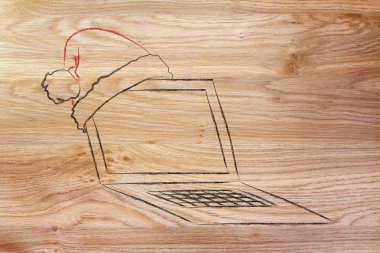 Santa claus şapka, Noel alışveriş online kavramı ile bilgisayar