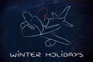 Kış ve Noel tatili: santa claus şapka ile uçak