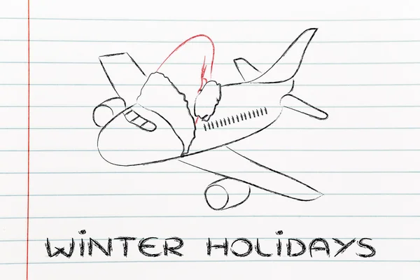 Winter and Christmas holiday: plane with santa claus hat — Stock Photo, Image