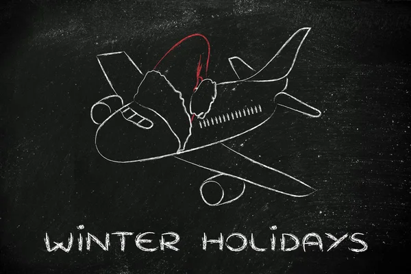 Winter and Christmas holiday: plane with santa claus hat — Stock Photo, Image