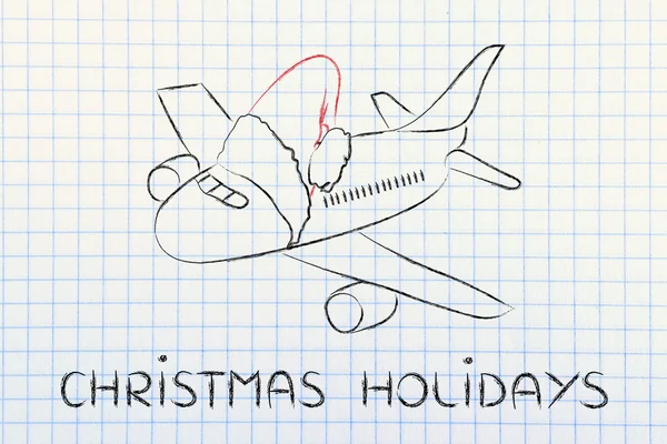 Winter- und Weihnachtsurlaub: Flugzeug mit Weihnachtsmann-Mütze — Stockfoto