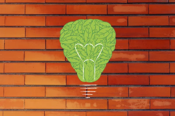 Lightbulb made of leaves, concept of green economy — Stock Photo, Image