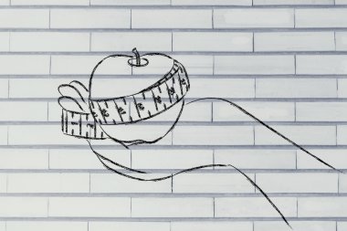 Teyp ölçme ile elma tutan el