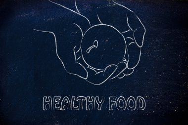 Teyp ölçme ile elma tutan el