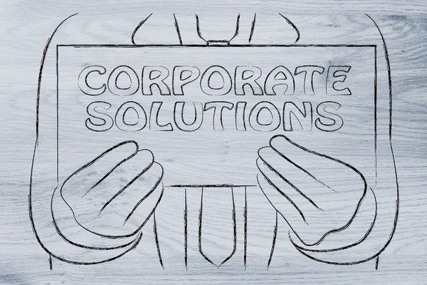 Man holding Corporate Solutions sign — Stock Photo, Image