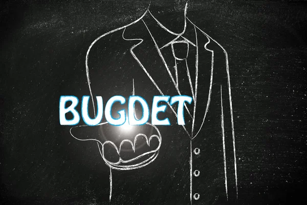 Business man handing out the word Budget — Stock Photo, Image