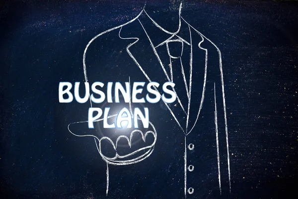 Affärsman som innehar ordet Business Plan — Stockfoto