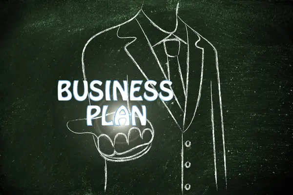 Бизнесмен со словом Business Plan — стоковое фото