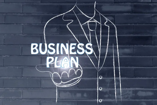 Business man holding the word Business Plan — Stock Photo, Image