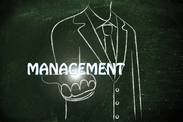 Affärsman dela ut ordet Management — Stockfoto