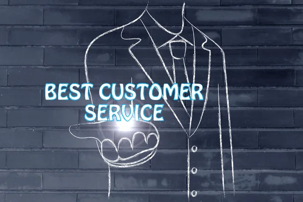 Obchodní muž drží slovo nejlepší služby zákazníkům — Stock fotografie