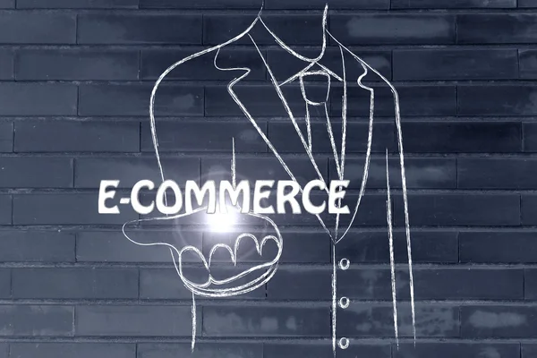 Obchodní muž drží slovo E-komerce — Stock fotografie