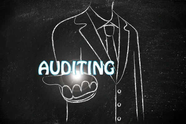 Business man handing out the word Auditing — Stock Photo, Image