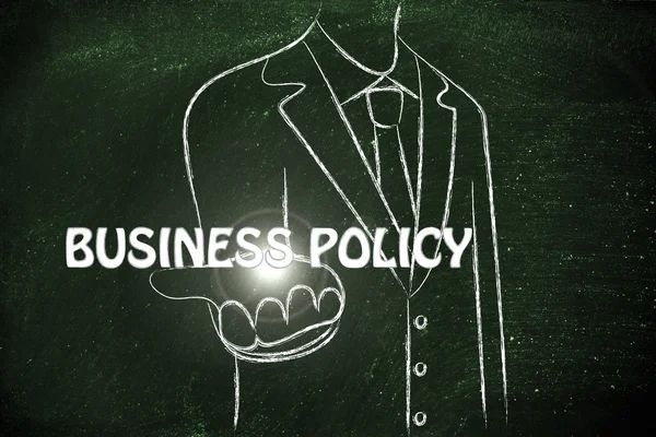 Hombre de negocios con la palabra Business Policy — Foto de Stock