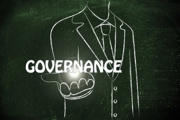 Affärsman som innehar ordet Governance — Stockfoto
