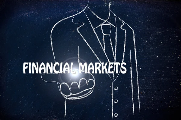 Business man handing out the word Financial Markets — Stock Photo, Image