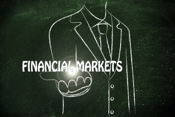 Business man handing out the word Financial Markets — Stock Photo, Image