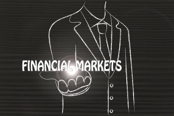 Geschäftsmann verteilt das Wort Finanzmärkte — Stockfoto