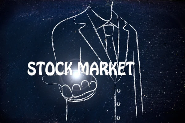 Affärsman dela ut ordet finansmarknaderna — Stockfoto