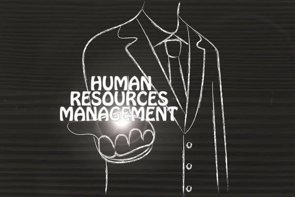 人的資源管理という言葉を配ってビジネス男性 — ストック写真