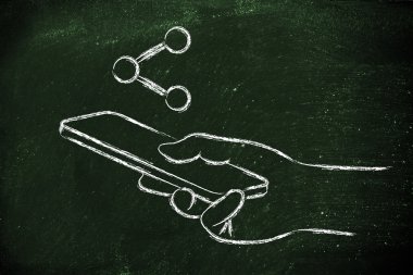 El ele tutuşan cep telefonu