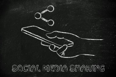 El ele tutuşan cep telefonu