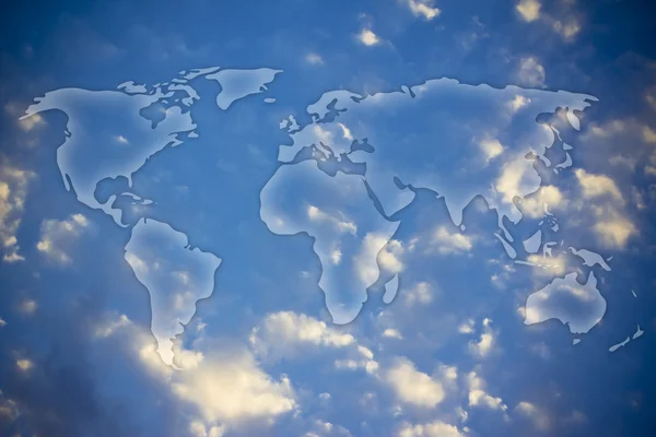 World map over a sky background