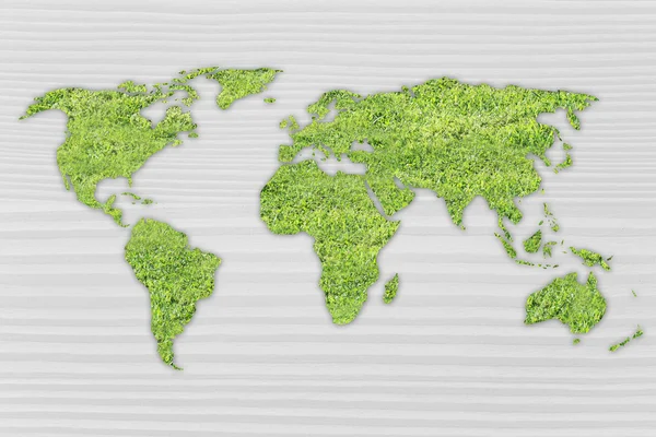 Kaart van de wereld gemaakt van groen gras — Stockfoto