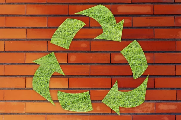 recycle symbol made of grass