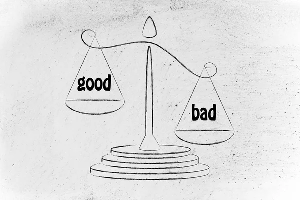 Metaphor of balance measuring the good and the bad — Stok fotoğraf