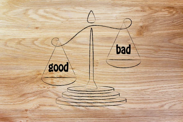 Metaphor of balance measuring the good and the bad — Stok fotoğraf