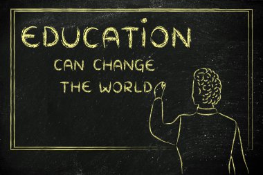 Teacher writing on blakboard about education