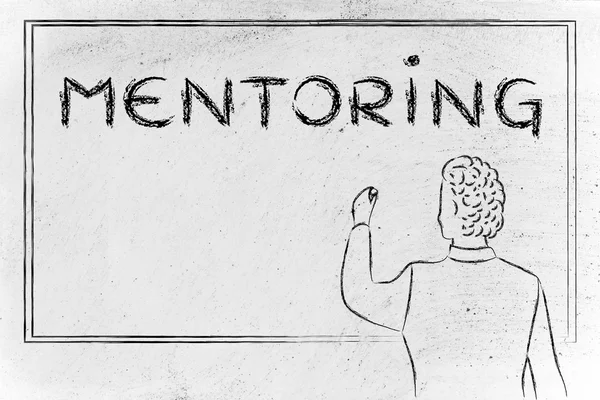 Teacher writing on blakboard about mentoring — Stock Photo, Image