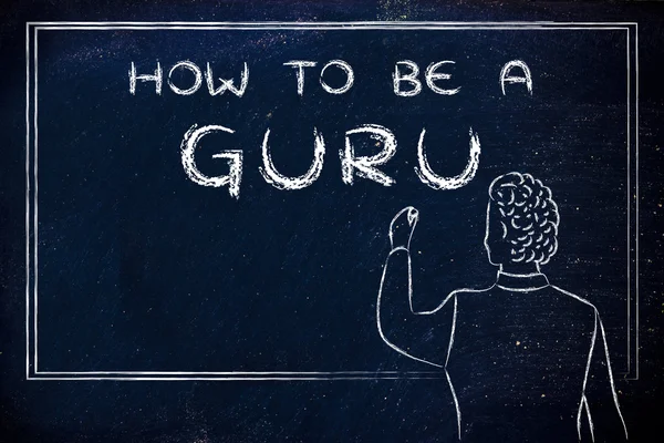 Teacher writing on blakboard: how to be a guru — 图库照片